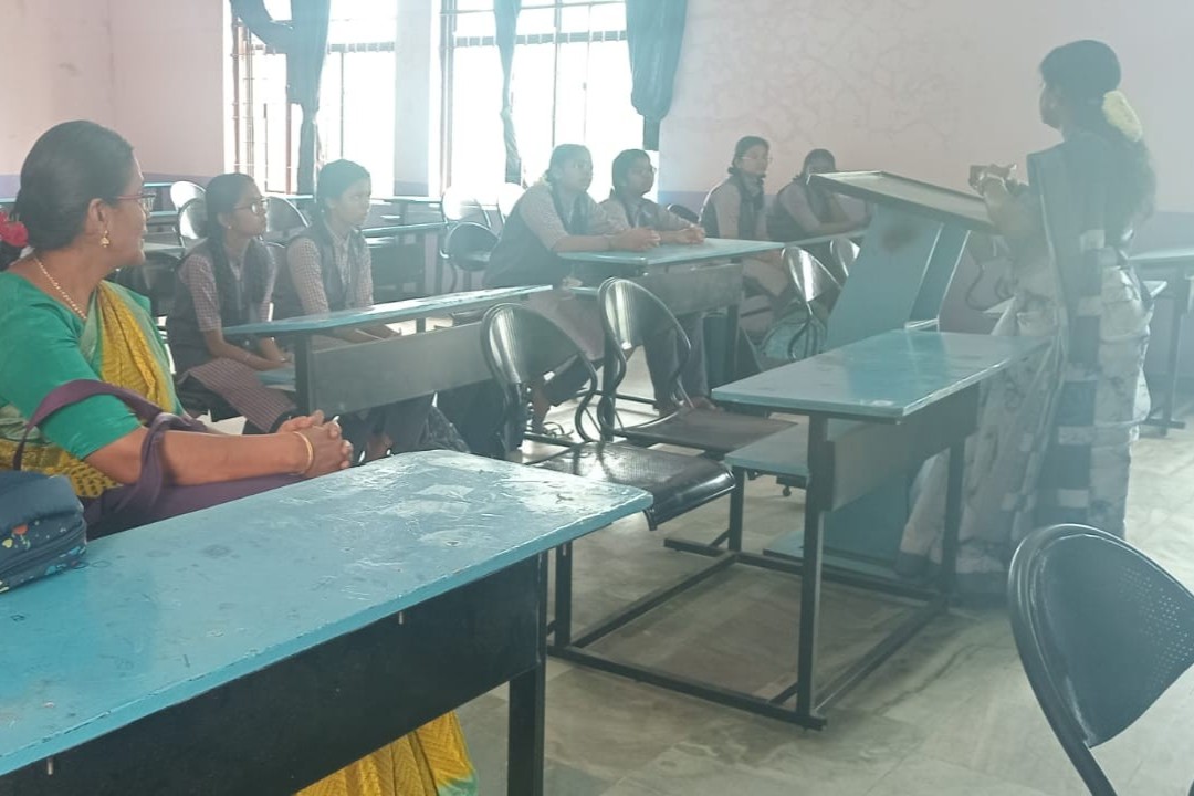Faculty members attending Zoho Creator training session